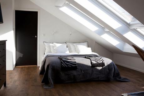 Dormitorio techos abuhardillados
