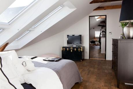 Dormitorio techos abuhardillados