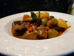 Carne de ternera  picante con maíz y níscalos