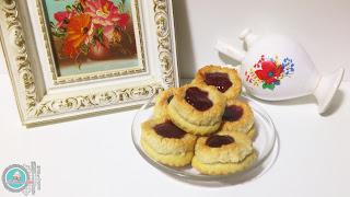 Dulces de eid al-fitr 3. Galletas coronadas de almendra y mermelada.