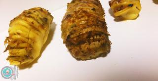 Patatas rellenas de atún y cebolla.