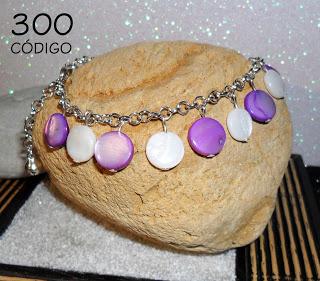 Concha, lava y arcilla polimérica.