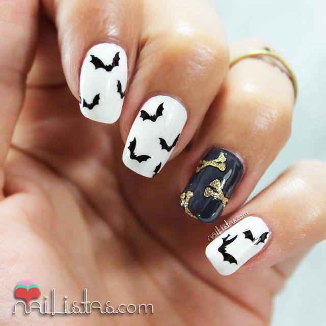 Uñas decoradas con murciélagos y huesos