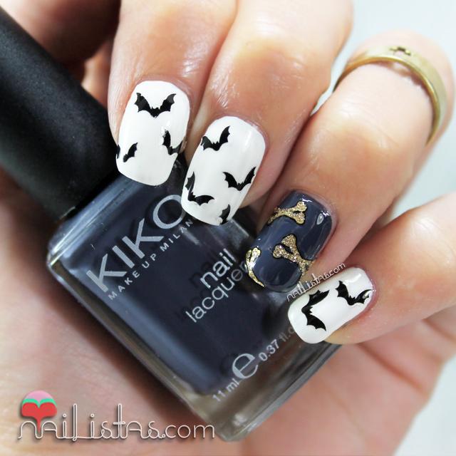 Uñas decoradas con murciélagos y huesos