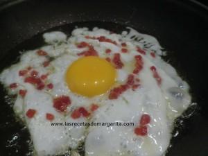 Huevos con jamón y pisto