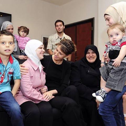 Foto: ‎مع عائلة الشهيد مصطفى ابراهيم المحمود (إدلب) - حزيران 2013
 #Syria #Asma #Assad #سورية #الأسد #الاسد #أسماء‎