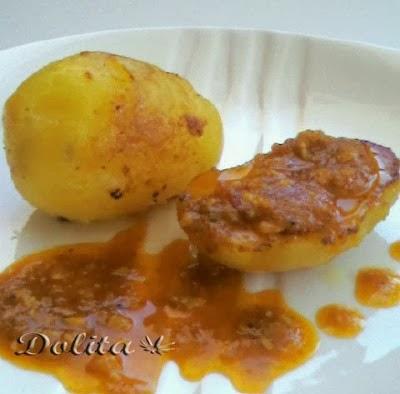 LOMO DE CERDO RELLENO CON PATATAS EN SALSA DE AJO