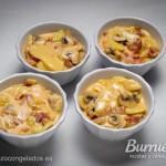 Gratín de patatas: recetas para saborear La mezcla de las patatas gratín, la salsa carbonara y los huevos batidos