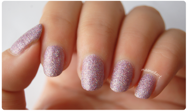 Review: Esmalte de glitter estilo arena color rosa de Claire's.