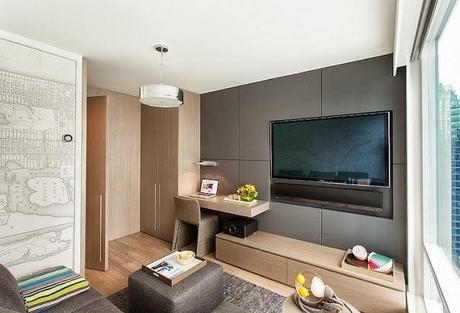 Una casa blanca, gris y amarilla