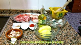 all i pebre con pollo y conejo