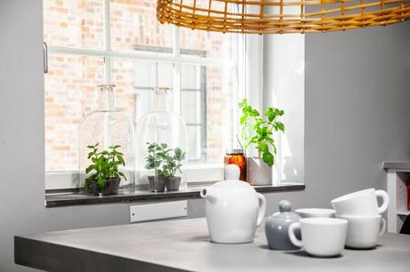 piso piloto decoración nórdica mesas de centro madera 3 patas distribución diáfana diseño piso piloto nordico diseño de interiores nórdicos decoración nórdica escandinava cocinas modernas pequeñas cocinas modernas blanco y gris cocina comedor salón diáfano decoración blog decoración nórdica 