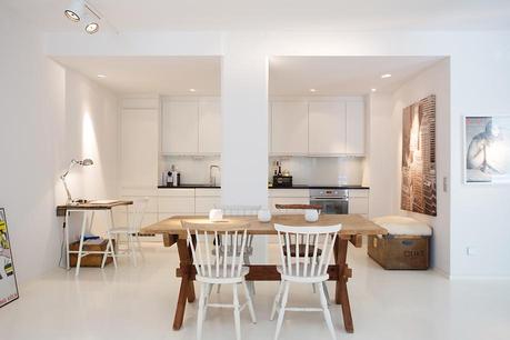white modern Scandinavian kitchen with rustic table