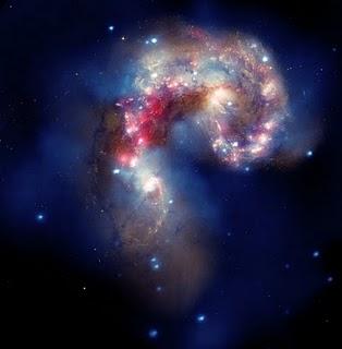 Imagen compuesta de las galaxias Antennae, a partir de datos de Chandra, Hubble y Spitzer