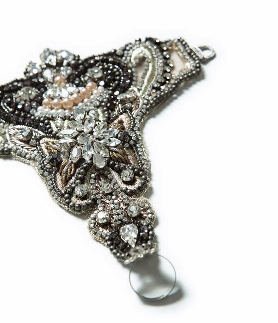 Anillo con brazalete