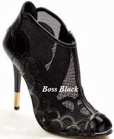 Letizia, con chaqueta de tweed multicolor, en un Congreso contra la Violencia de Género