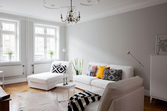 Paredes grises muebles blancos suelo de madera interiores pisos pequeños nórdicos inspiración salón ikea estilo nórdico sencillo estilo nórdico muebles ikea decoración suelo madera de roble decoración en gris y blanco blog decoración nordica escandinava blog decoración diseño de interiores 