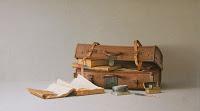 Una maleta. Libros. Un viaje