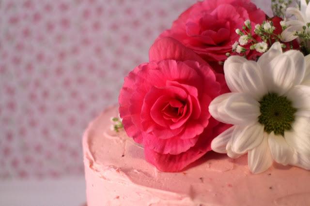 Triple lemon strawberry layer cake with strawberry swiss meringue buttercream