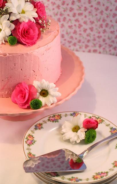 Triple lemon strawberry layer cake with strawberry swiss meringue buttercream