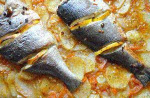 Imagen de Dorada al horno con patatas y cebolla