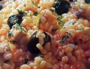 Imagen de Arroz meloso con bacalao y aceitunas negras
