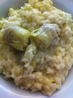 Arroz cremoso a las finas hierbas con alcachofas