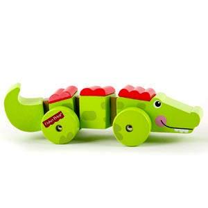 Cocodrilo articulado sobre ruedas juguete de madera para bebés a partir de 2 años de Fisher-Price