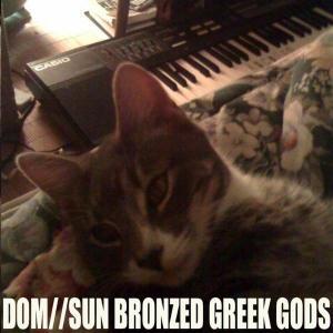 Dom – Sun Bronzed Greek Gods