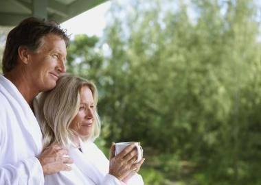 Couple Wearing Bathrobes on Porch