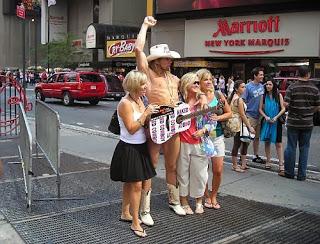 Un cowboy en Times Square. Manhattan