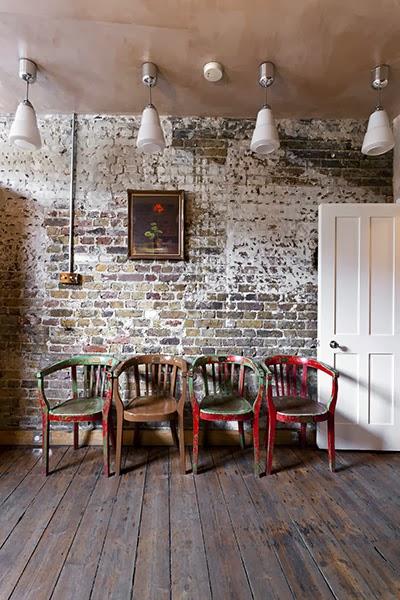 Una preciosa casa georgiana con el ladrillo visto como auténtico protagonista