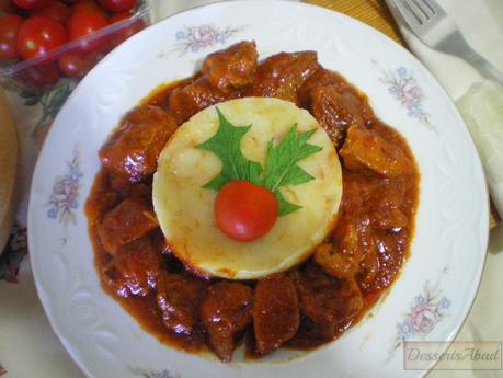 Carne con tomate