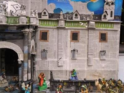 Imágenes de un pesebre hecho con papel y cartón