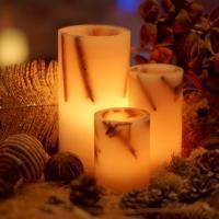 Decoración navideña con velas de cera Decoración navideña con velas de cera