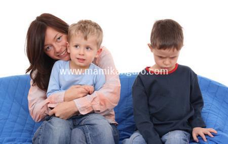 mother and two sons on the sofa - portrait
