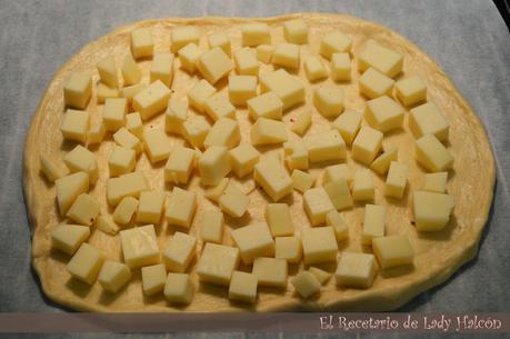 Pizza casera de lacón y queso provolone