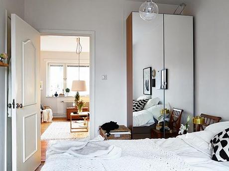 Inspiración y calidez de un dormitorio blanco y negro