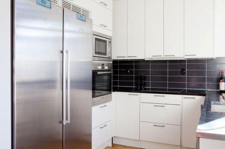 Ático moderno con amplia terraza muebles de diseño estilo nórdico escandinavo diseño de exteriores terrazas decoración interiores pequeños decoración diseño áticos decoración de salones nórdicos cocinas blancas modernas blog decoración de interiores Ático moderno con amplia terraza