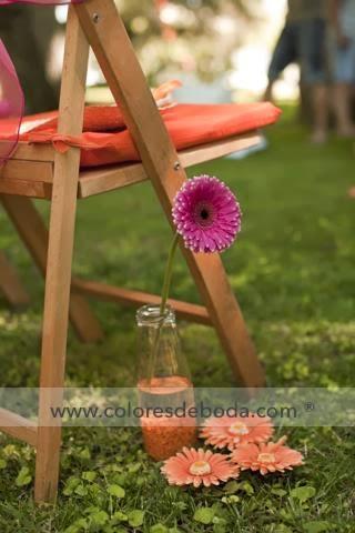 Decoración de boda en tonos fucsia y naranja