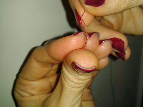 como hacer un nudo al hilo. paso 5