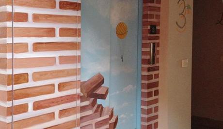 Trampantojo de paisaje en el ascensor