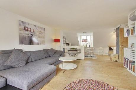 muebles de diseño danés mezcla piezas ikea con diseño original fritz hansen montana diseño danés estilo nórdico escandinavo espacio extra de almacenaje exposición distribución en L espacios diáfanos Distribución de zonas comunes en L decoración de áticos chimenea de bioetanol para separar ambientes blog decoracion interiores 