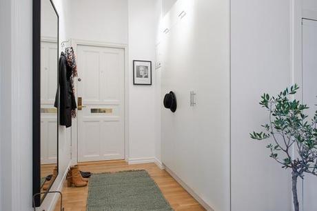 ventanales en arco Estilo nórdico con toques de azul estilo nórdico decoración interiores áticos decoración diáfana salón cocina decoración de salones decoración blanco madera y azul gris blog decoración nordica escandinava 