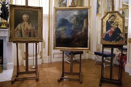Three paintings seized by the Nazis are displayed at an official ceremony at the French Culture Ministry to announce their return to their rightful owners, in Paris