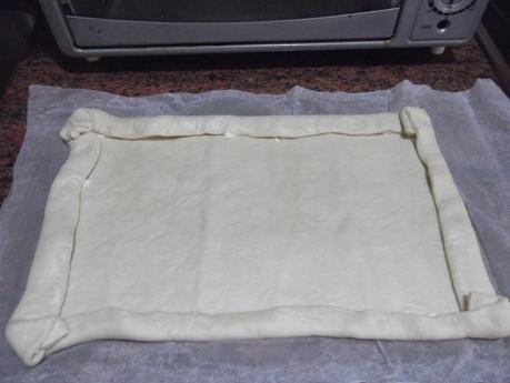 PIZZA DE SALMÓN CON BORDE DE QUESO