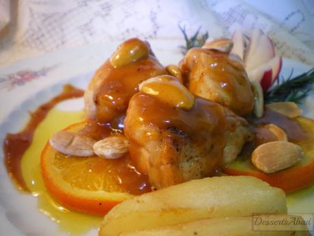 Pollo salteado con  naranja y almendras