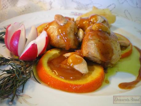 Pollo salteado con  naranja y almendras