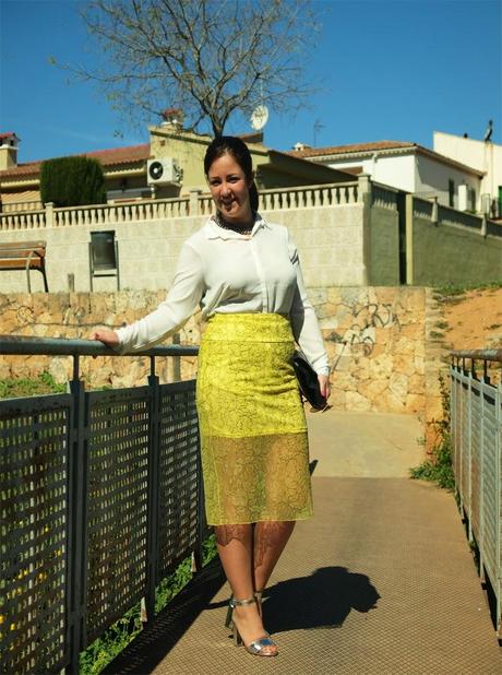 Yellow skirt with silver sandals