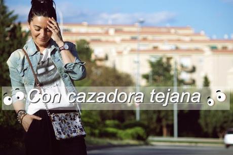 Con cazadora tejana...